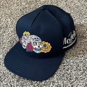 Modelo Navy Snapback Hat with Día de Los Muertos Design by Mister Cartoon